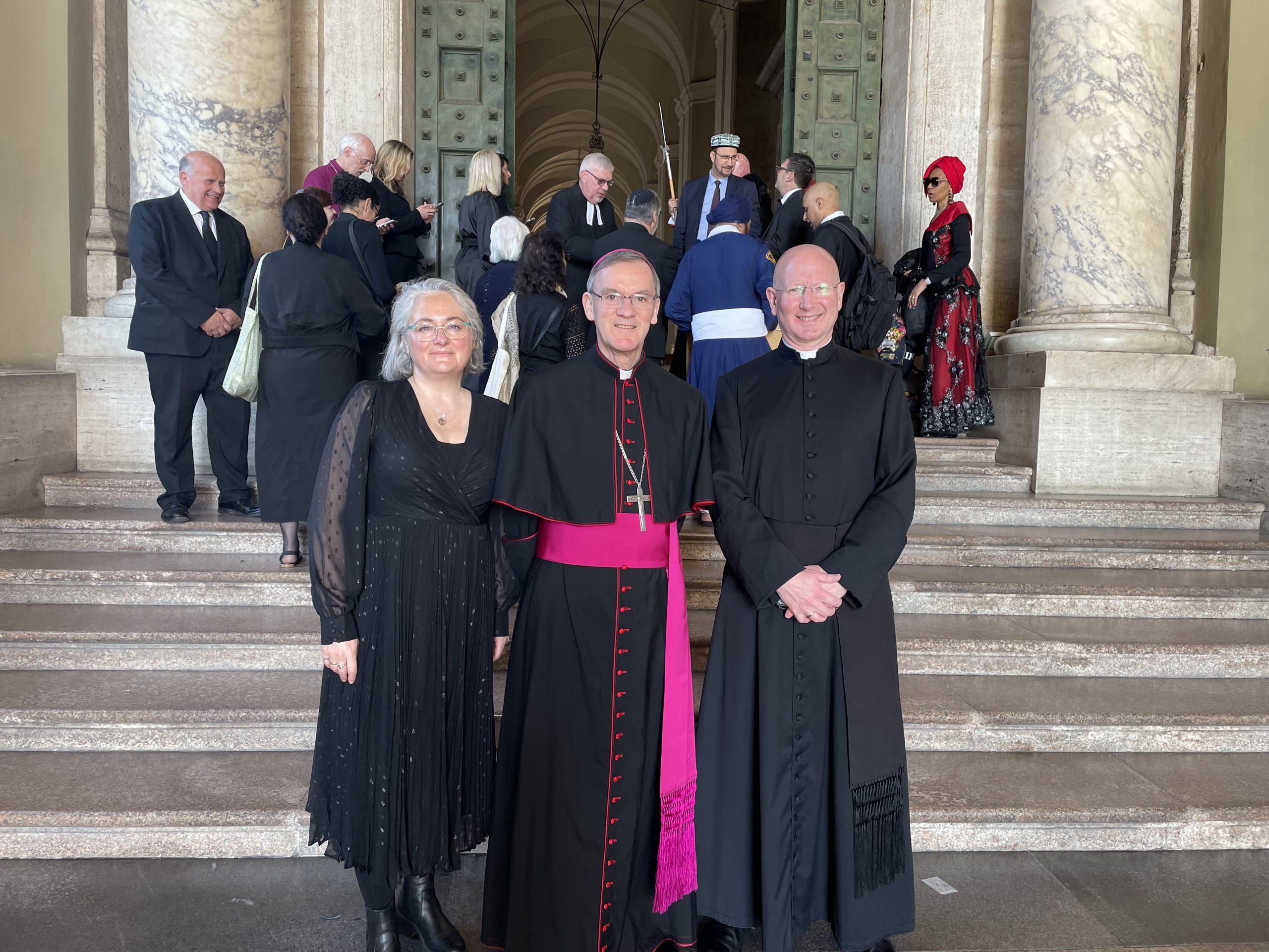 Dr Emma Gardner, Bishop John Arnold, and Canon Michael Jones gather at The Vatican