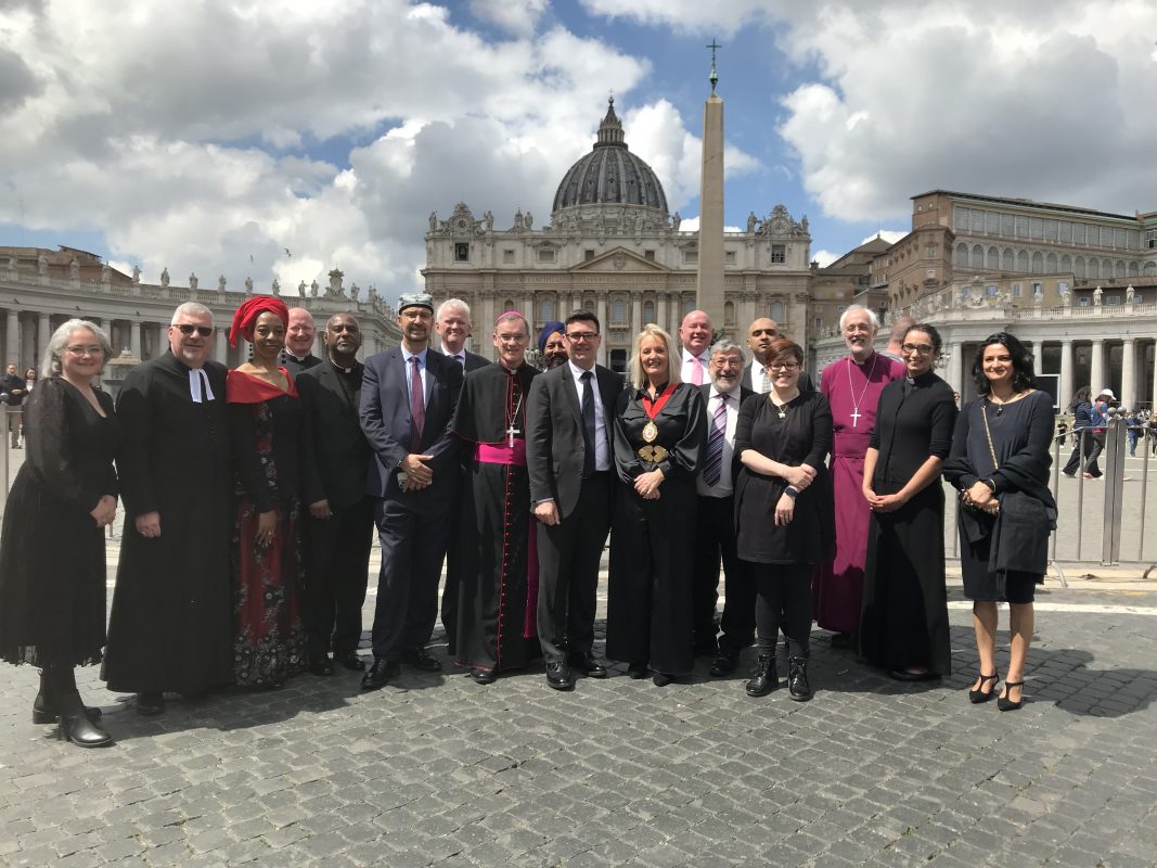 Greater Manchester faith and civic leaders gather in front of St Peter's